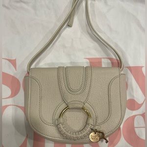 See by Chloe Crossbody in off-white.